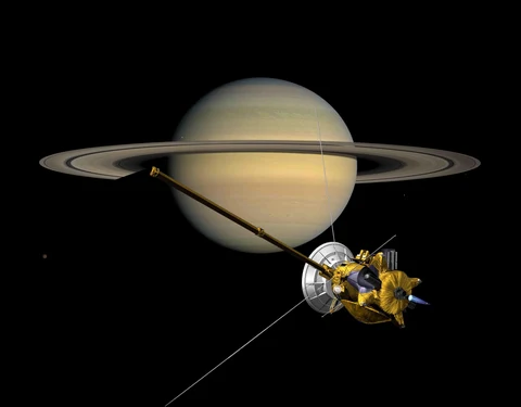 Minh họa của họa sĩ: tàu Cassini ở cạnh Sao Thổ và vành đai
